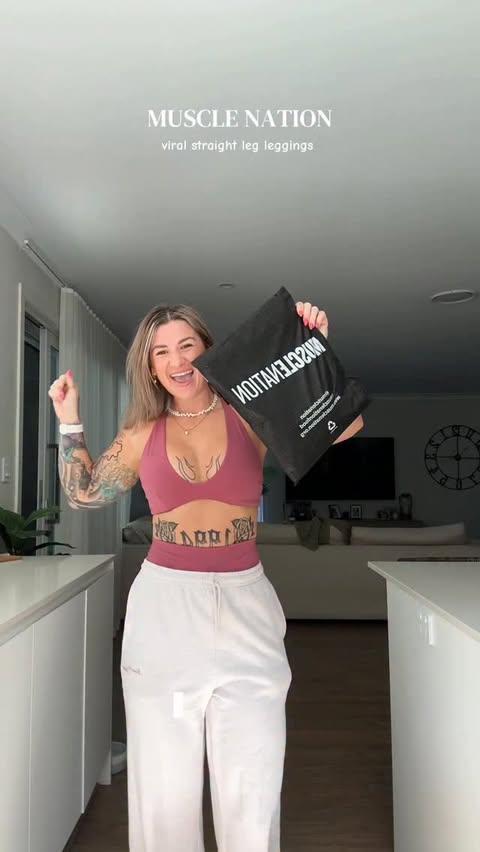 Instagram post by @_elliewilsonfitness__ for Muscle Nation. Caption reads: THEY ARE HERE !! @musclenation viral Aura Straight....