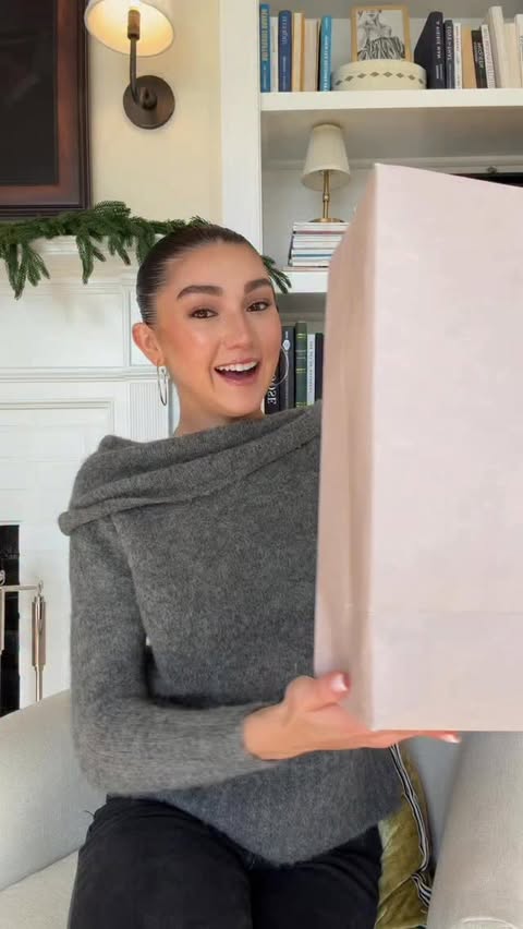 Instagram post by @katebartlett for Jimmy Choo. Caption reads: the best unboxings are @jimmychoo unboxings 🎄♥️.