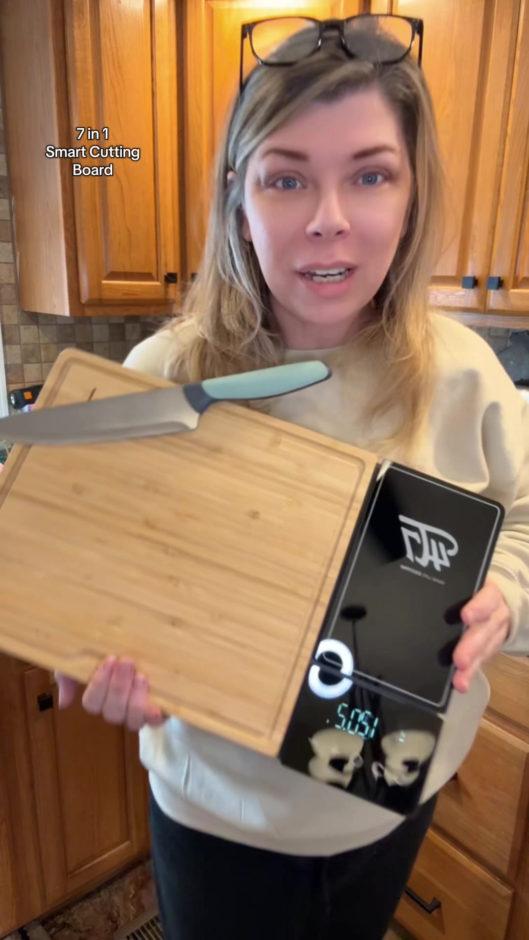 TikTok post by @a.hutch99 for Kikcoin. Caption reads: [...] #tiktokshopholidayhaul #gadgets @Kikcoin....
