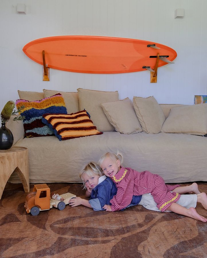 Instagram post by @hannahbeaden for Miss Amara. Caption reads: Making our space more cozy with @missamaraloves....