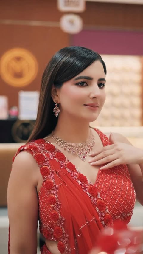 Instagram post by @theartistreshumalhotra for Malabar Gold and Diamonds. Caption reads: [...] with timeless sparkle at....