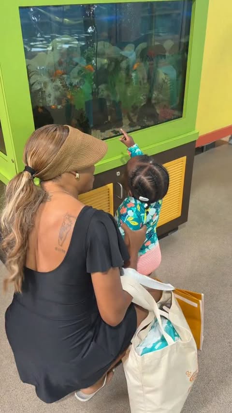 Instagram post by @lifeofreyhauna for Goldfish Swim School. Caption reads: [...] as a mom. I also love that....
