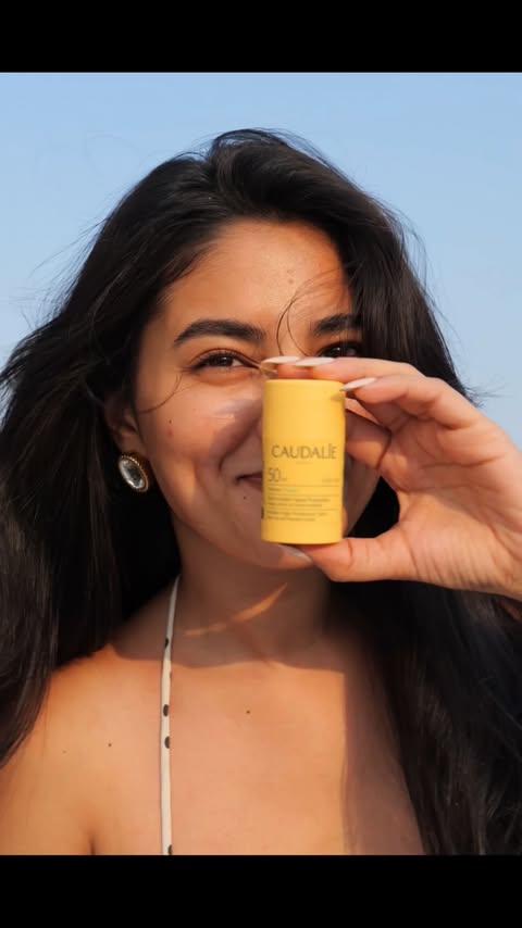 Instagram post by @thesassthing_ for Caudalie. Caption reads: [...] never leaving home without her 🥰💛....