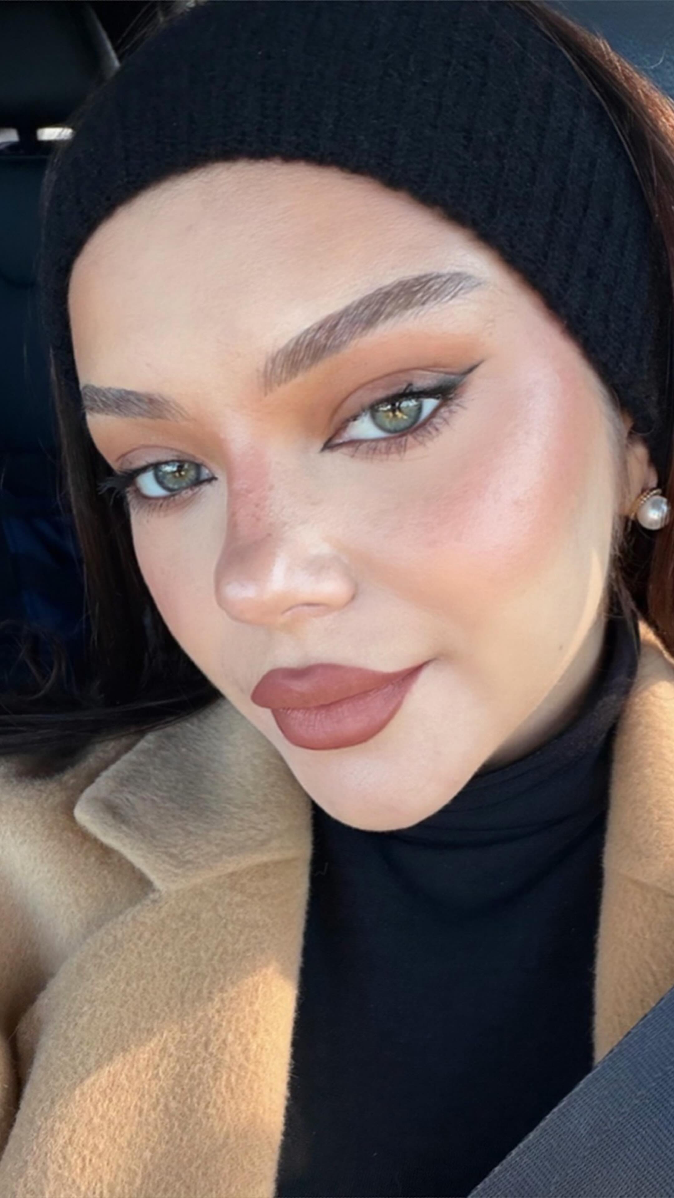 Instagram post by @michaelaberdaga for CAIA Cosmetics. Caption reads: This is how you layer your makeup to last all day....