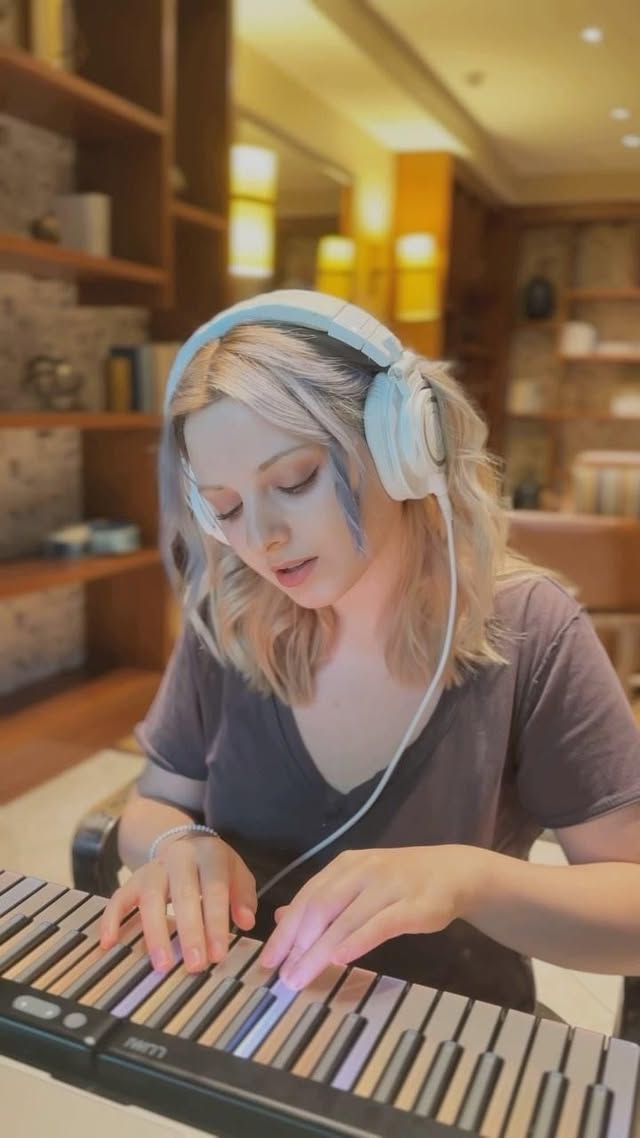 Instagram post by @maymusic for Spitfire Audio. Caption reads: [...] version of my latest single using Spitfire....