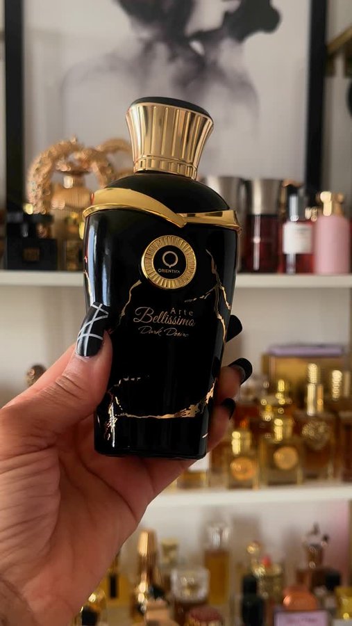 Instagram post by @bossbabestace for Orientica Perfumes. Caption reads: ARTE BELLISSIMO DARK....