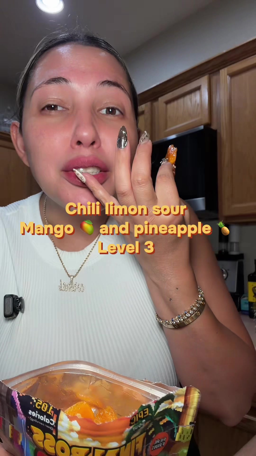 TikTok post by @lacoronel90 for Final Boss Sour. Caption reads: [...] Chili limon mango and pineapple....