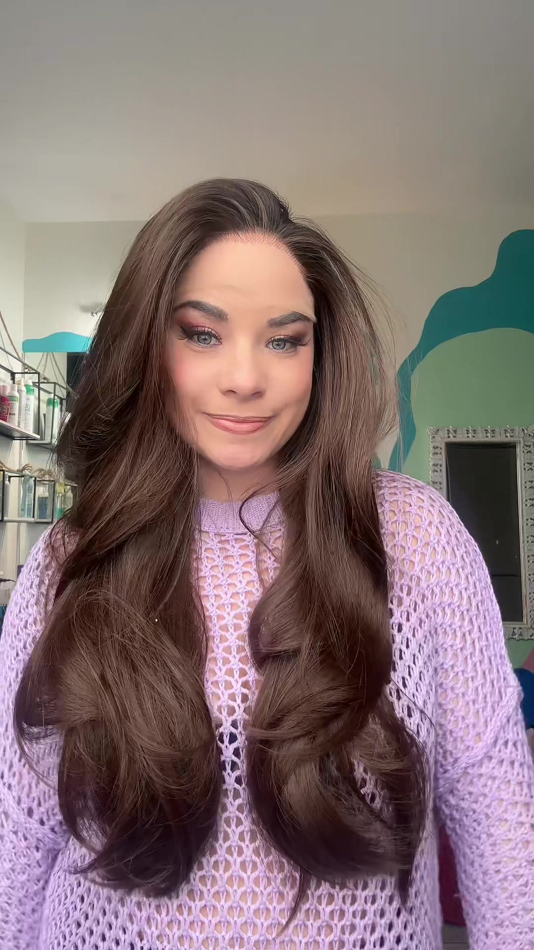 TikTok post by @elizabethwearswigs for Chelsey Smith Cosmetics. Caption reads: "ELIZABETHM" to save 10% off wigs from @Chelsey....