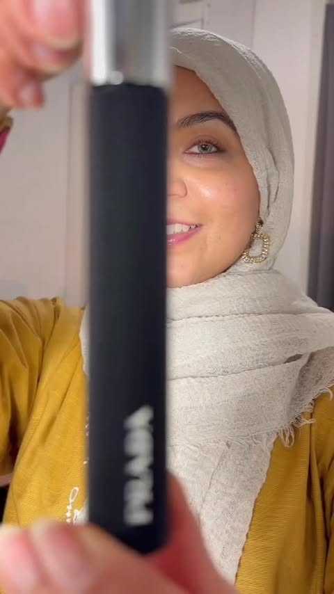 Instagram post by @glambyghiz for Prada Beauty. Caption reads: A mascara with a unique wand. 

•
•

AD|Gifted....