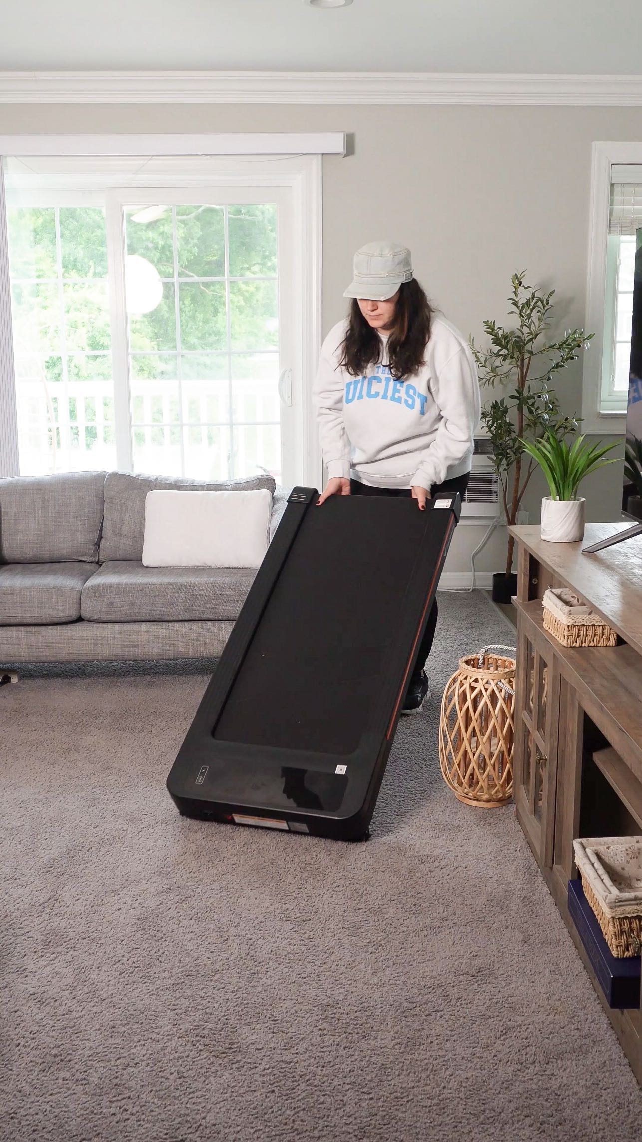 Instagram post by @busekaragozler for Merach. Caption reads: Obsessed with my @merachfit walking pad! It’s made....
