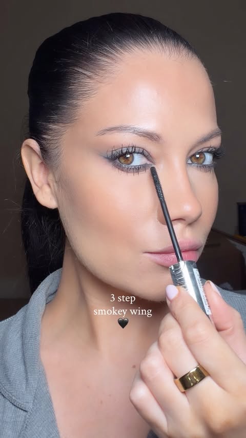 Instagram post by @jacintaspencer for Armani beauty. Caption reads: AD. Easy 3 step Smokey wing 🖤 • @armanibeauty....
