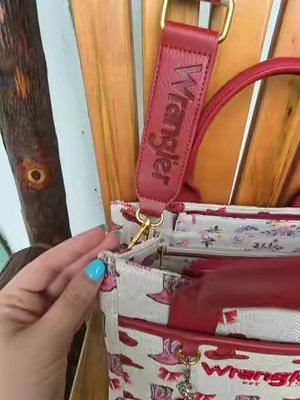 TikTok post by @jessswanson111 for Rustic Charm Bootic. Caption reads: [...] #westernstylepurse @Rustic Charm Bootic.