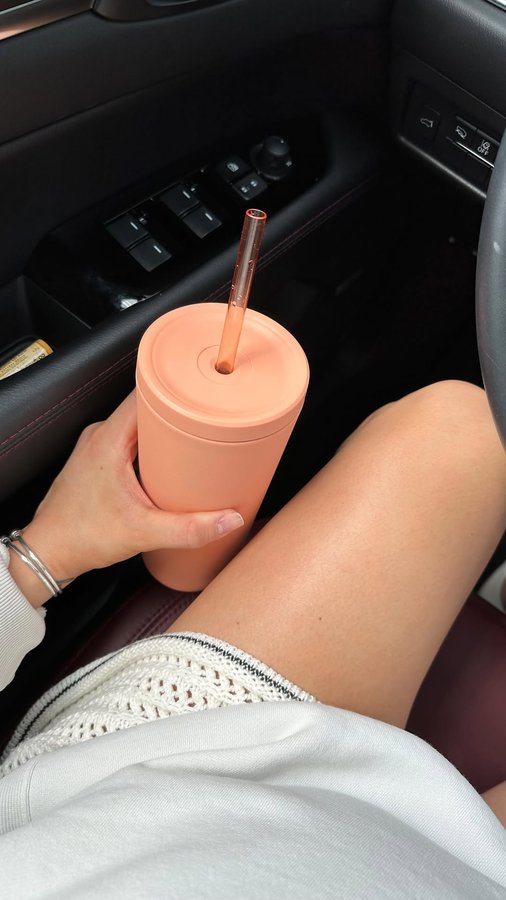 Instagram post by @caitlindechiara for Manna Hydration. Caption reads: @mannahydration helping stay hydrated all summer....