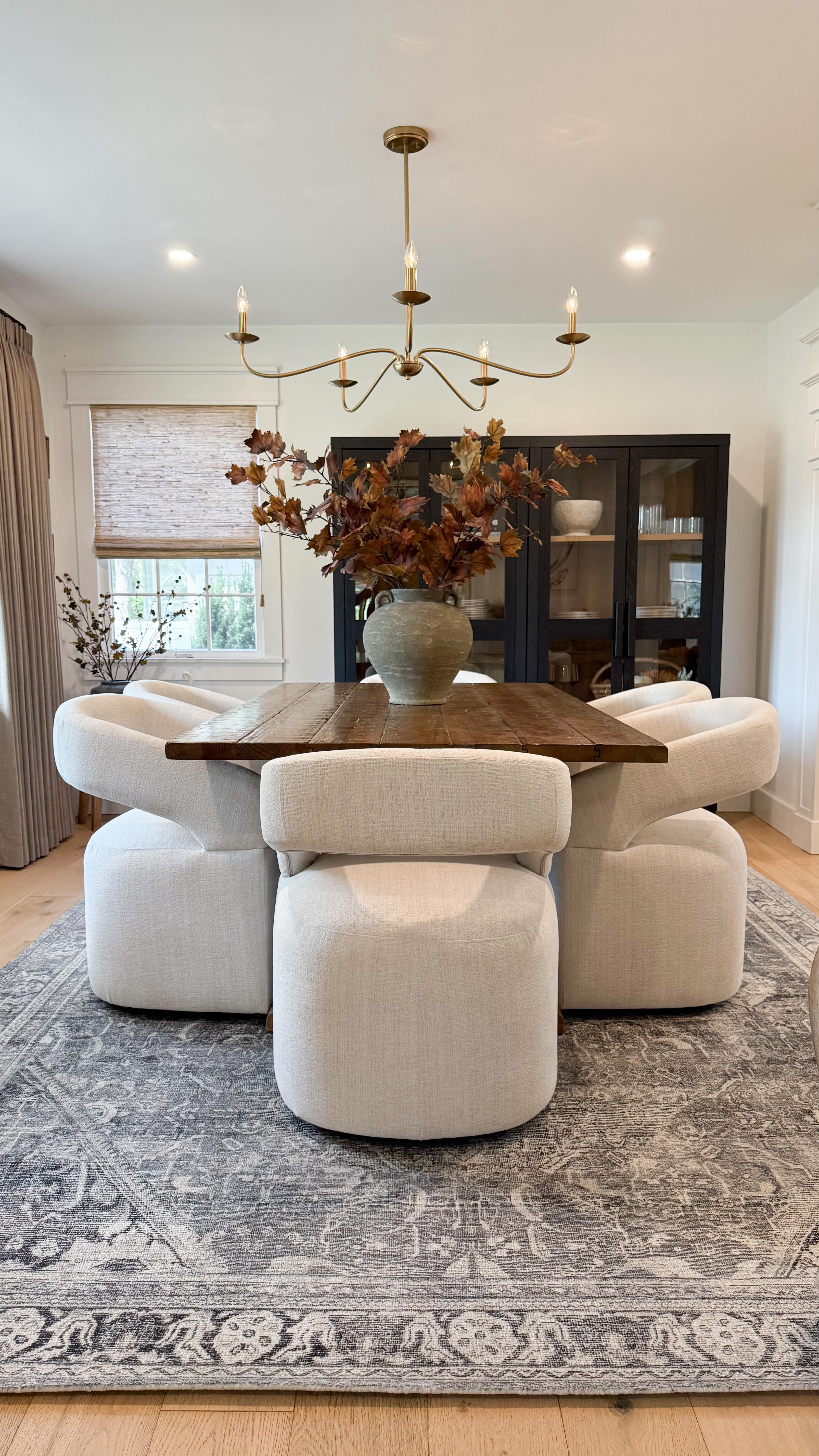 Instagram post by @dpiahome for Magnolia. Caption reads: [...] how my new area rug from the Magnolia Home....