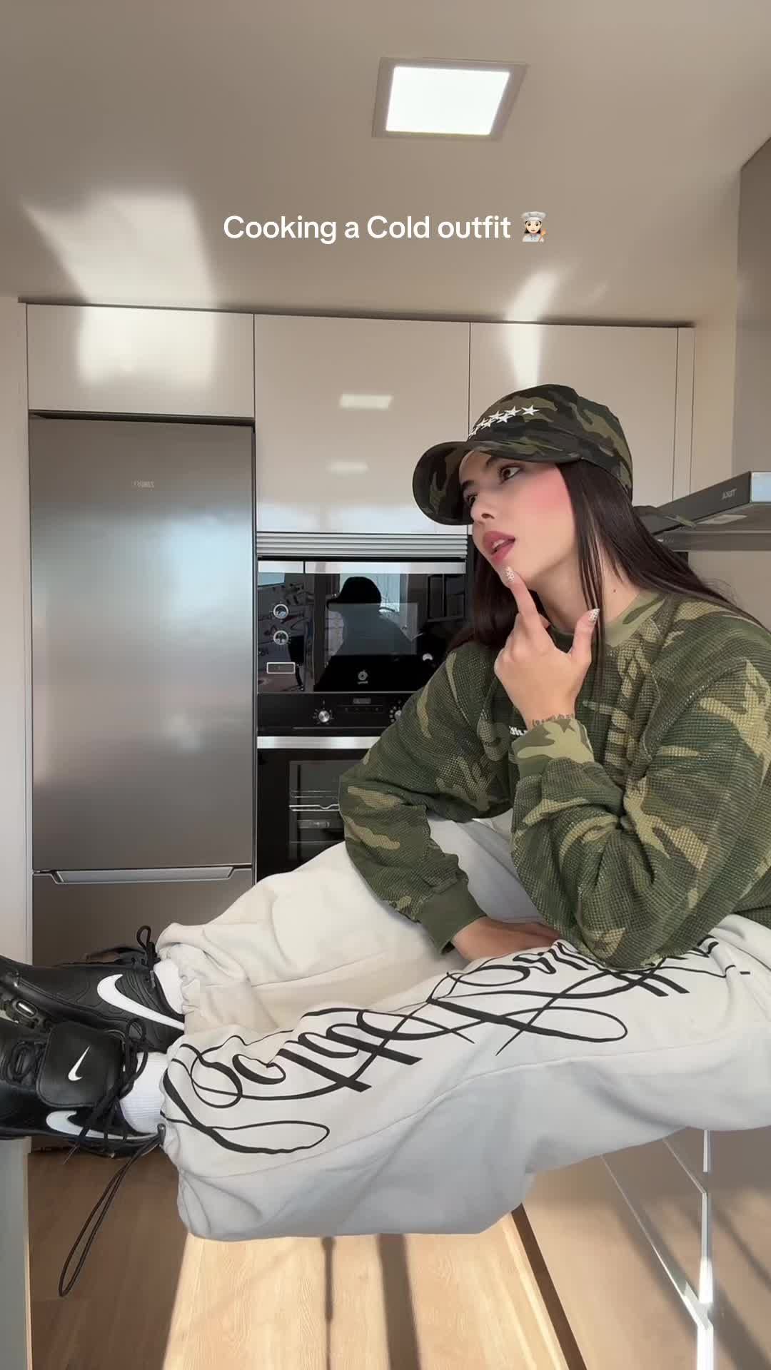 TikTok post by @kathy_havana for Cold Culture. Caption reads: Cooking a Cold outfit 👩🏻‍🍳 @Cold Culture  publi....