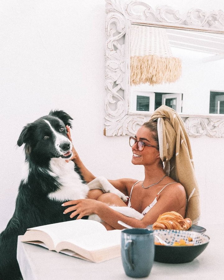 Instagram post by @leonormacedo for Sand Cloud. Caption reads: How a sunday morning should look like🥐🐶☕📖.