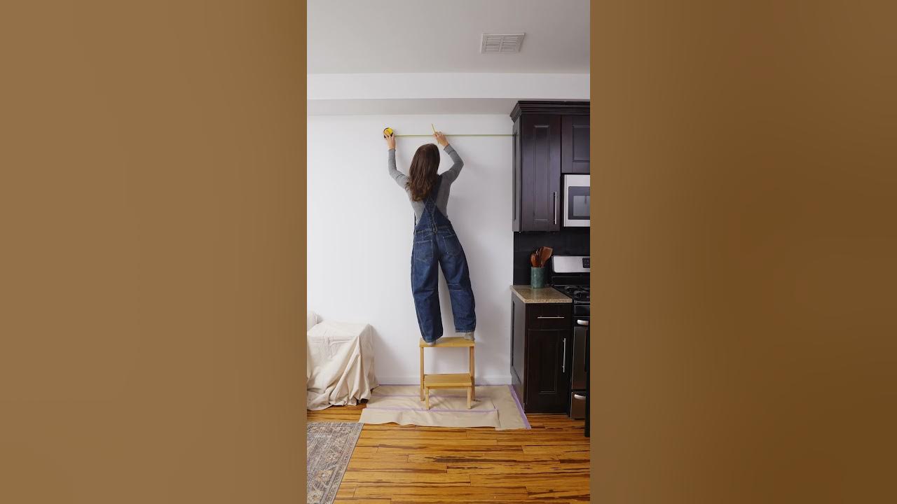 YouTube post by @apartmenttherapy for Apartment Therapy. Caption reads: The Surprising DIY that Helped Transform this Open....