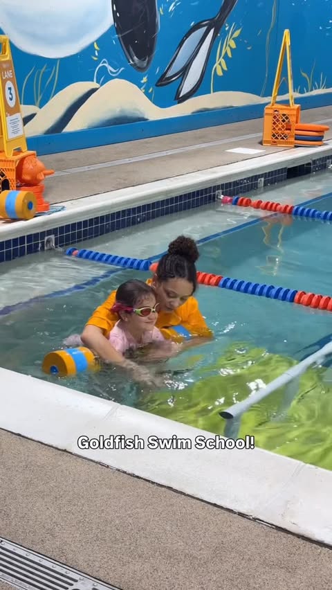 Instagram post by @jennababiolakis for Goldfish Swim School. Caption reads: [...] 🐟 First lesson FREE at Goldfish Swim....