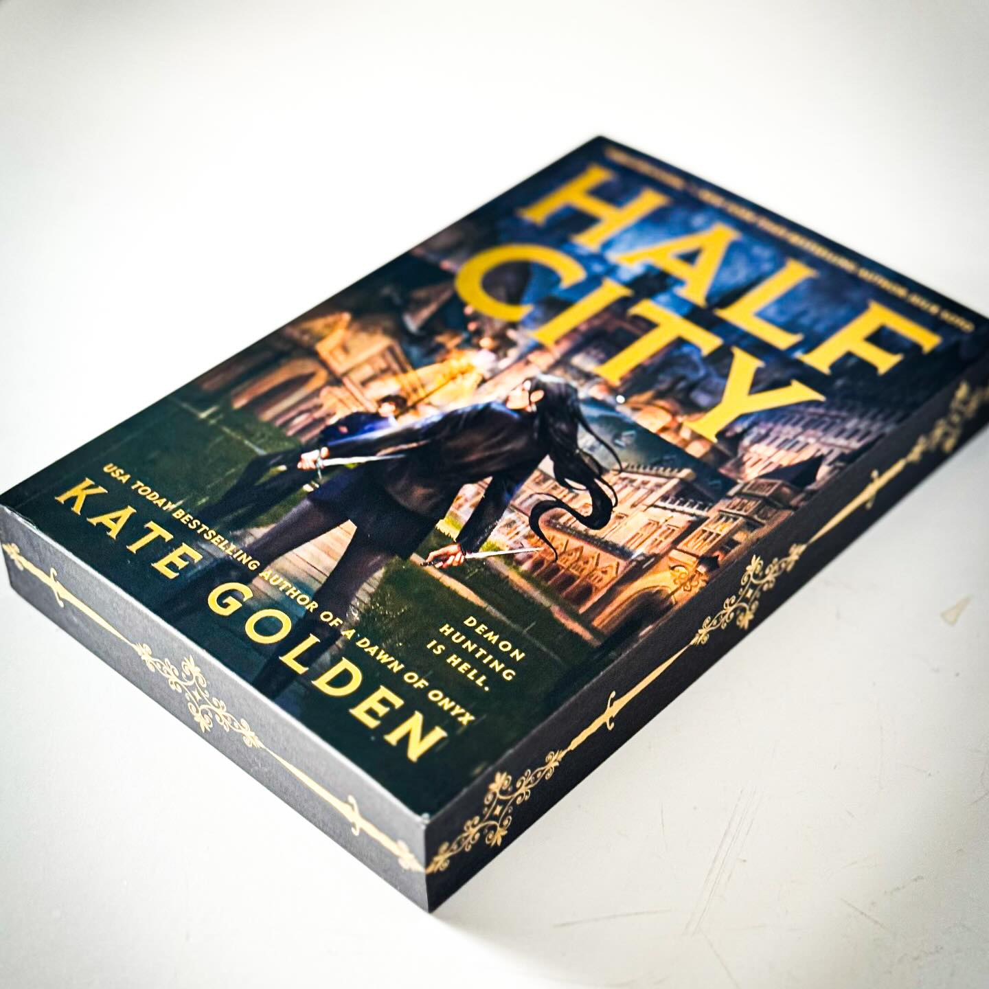 Instagram post by @shopcoffeekids for Berkley Publishing Group. Caption reads: ⚔️Dark academia ⚔️ Demon hunters 🖤 Brooding, sexy....