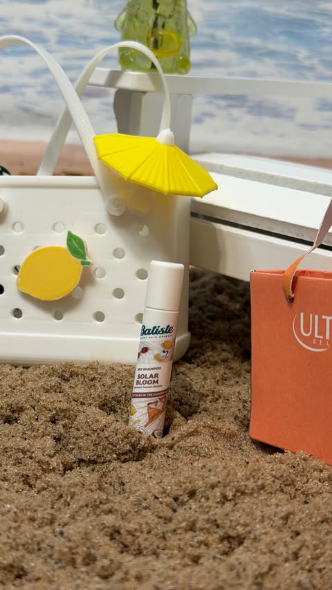 Instagram post by @kilas.miniverse for Batiste US. Caption reads: The beach called… and it said to grab the new....