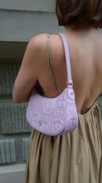 Instagram post by @maryljean for Etienne Aigner AG. Caption reads: One bag, seven looks @aignermunich 💜
#AIGNER....