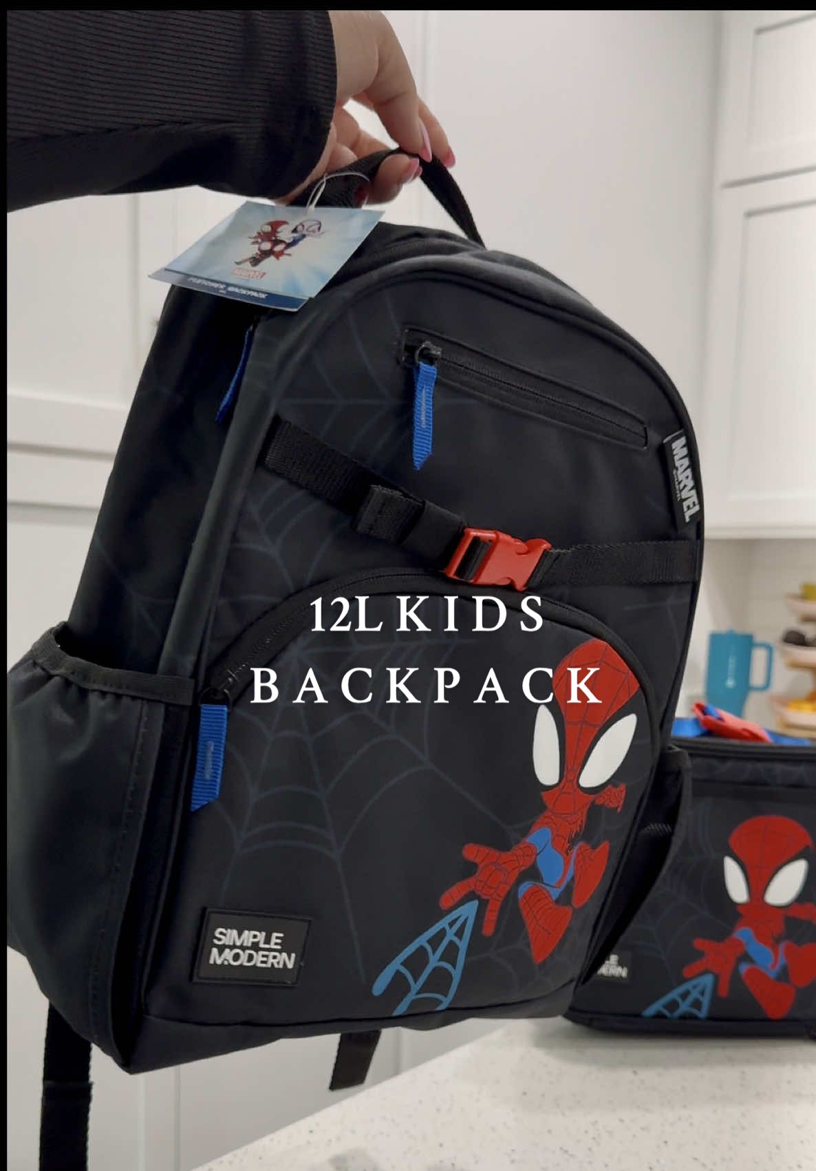 TikTok post by @rossflst for Simple Modern. Caption reads: For all the Spidey moms 🕷️🥰 & yes this backpack....
