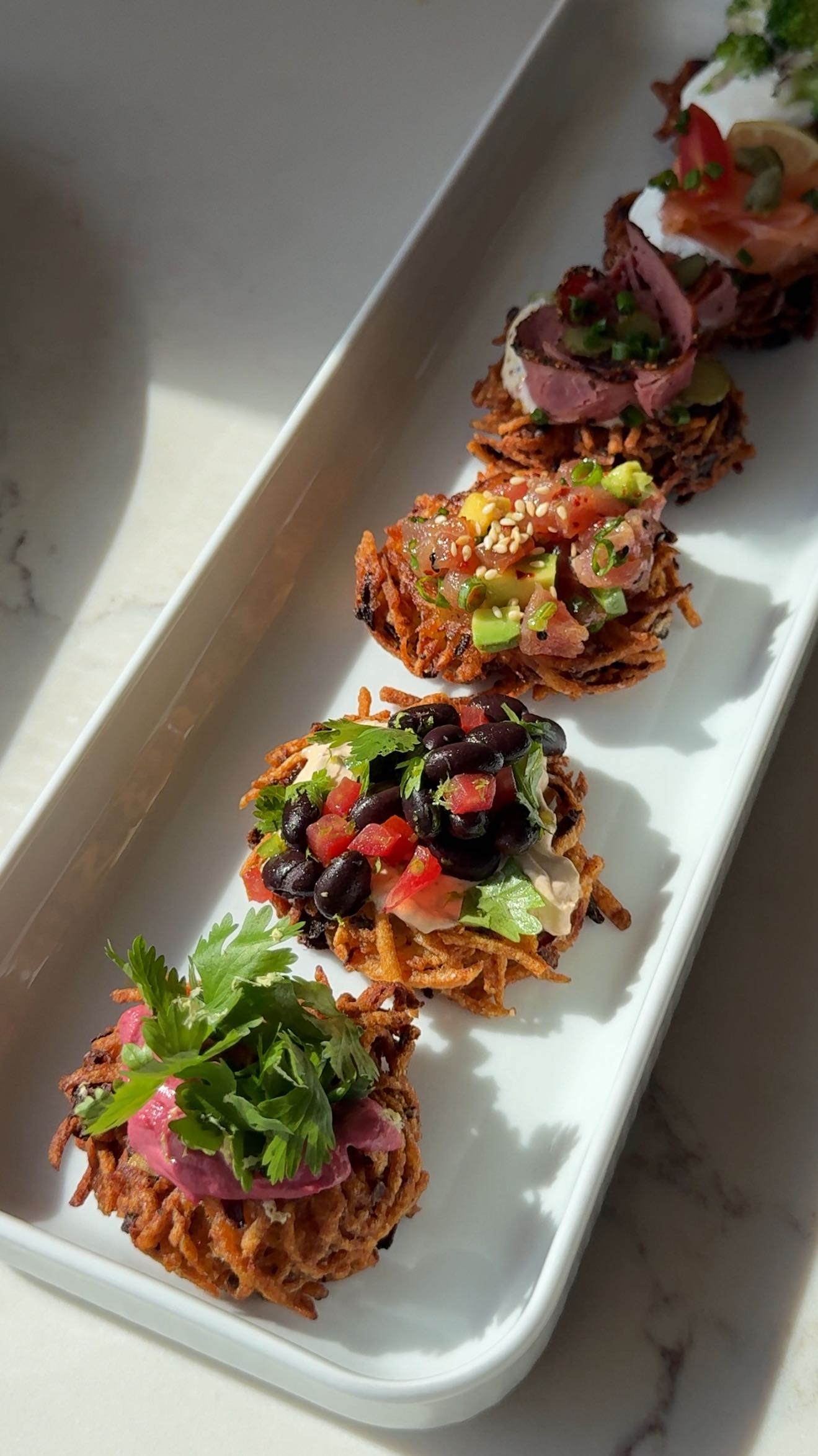 Instagram post by @adeenasussman for Williams Sonoma. Caption reads: I teamed up with @williamssonoma to create seven....