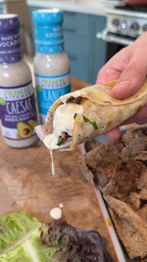 Instagram post by @bobbyparrish for Primal Kitchen. Caption reads: [...] the viral doner kebab recipe using....