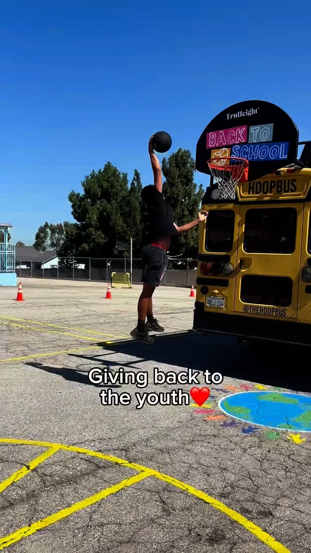 Instagram post by @quincyjhelsel for TruHeight Vitamins. Caption reads: @thehoopbus @truheightvitamins #hoopbus #truheight....