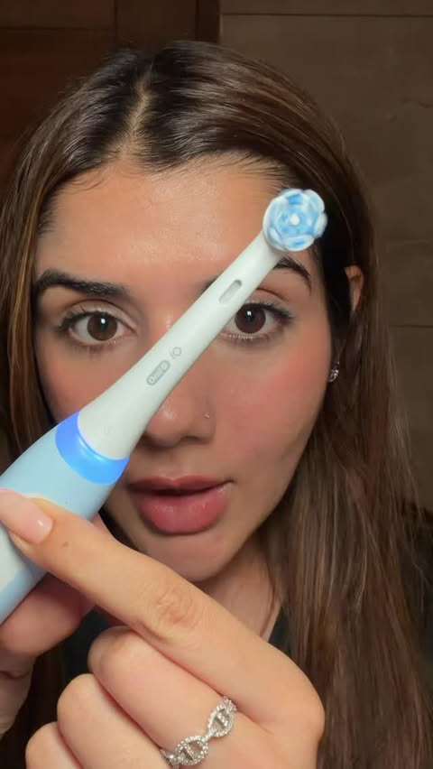 Instagram post by @dishabatra08 for Oral-B. Caption reads: [...] Blinkit???? An electric toothbrush from....