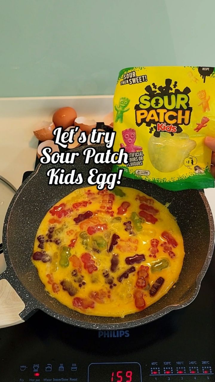 Instagram post by @foodmakescalhappy for Sour Patch Kids. Caption reads: Hey @sourpatchkids 🐣 rmb to eat your protein k....