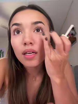 TikTok post by @sighanabel for Babygodewy Beauty. Caption reads: I loveeee 💛 @babygodewybeauty #fauxfreckles....