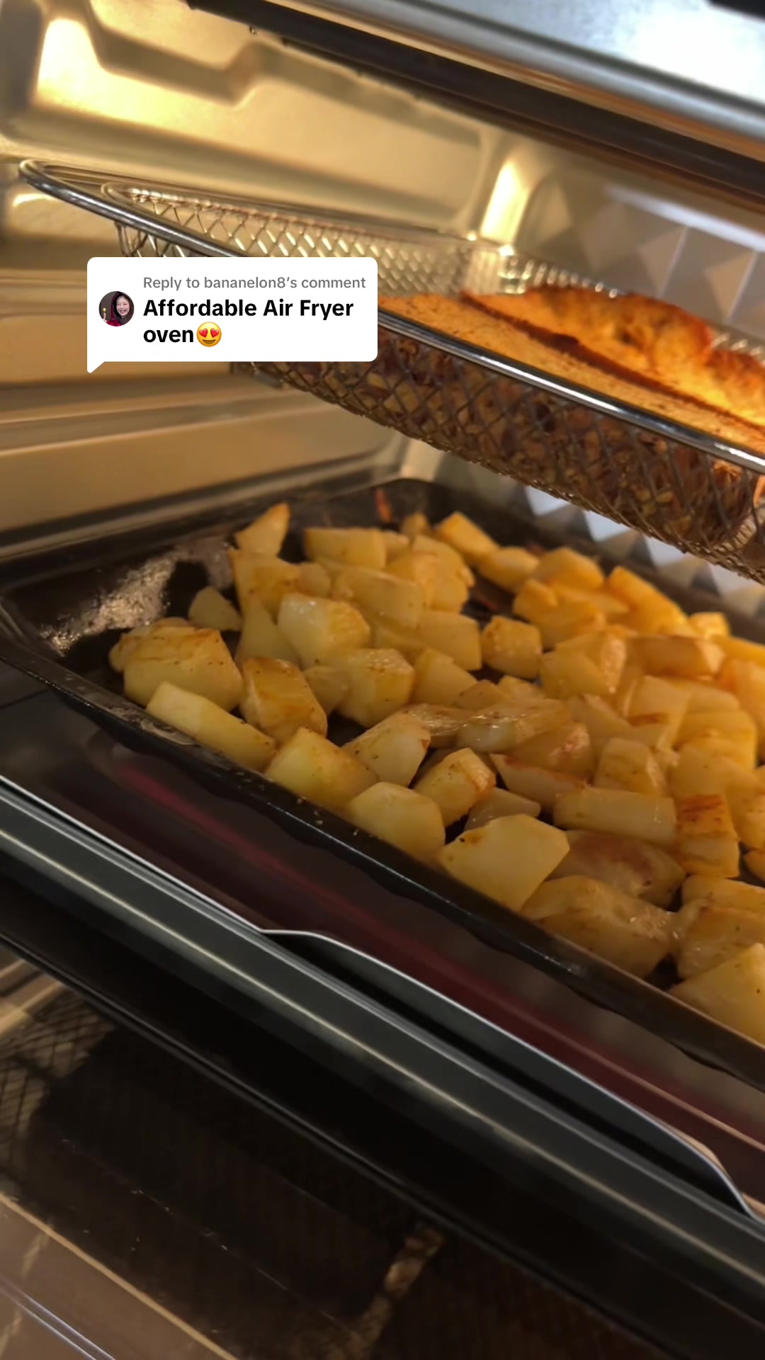 TikTok post by @mae_str8backtoherroots for Kitcheninthebox. Caption reads: Replying to @bananelon8  #ExtraLargeAirFryer....