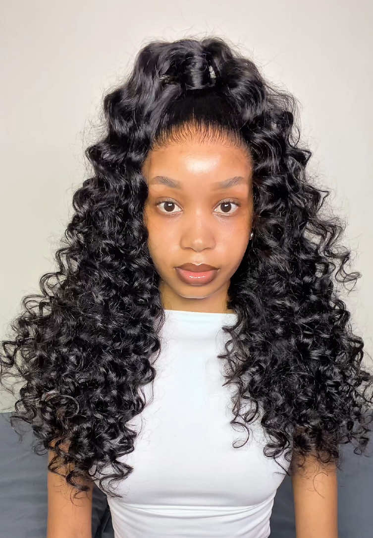 TikTok post by @gorgiiie_m for Wiggins Hair. Caption reads: I love a simple half-up, half-down hairstyle....