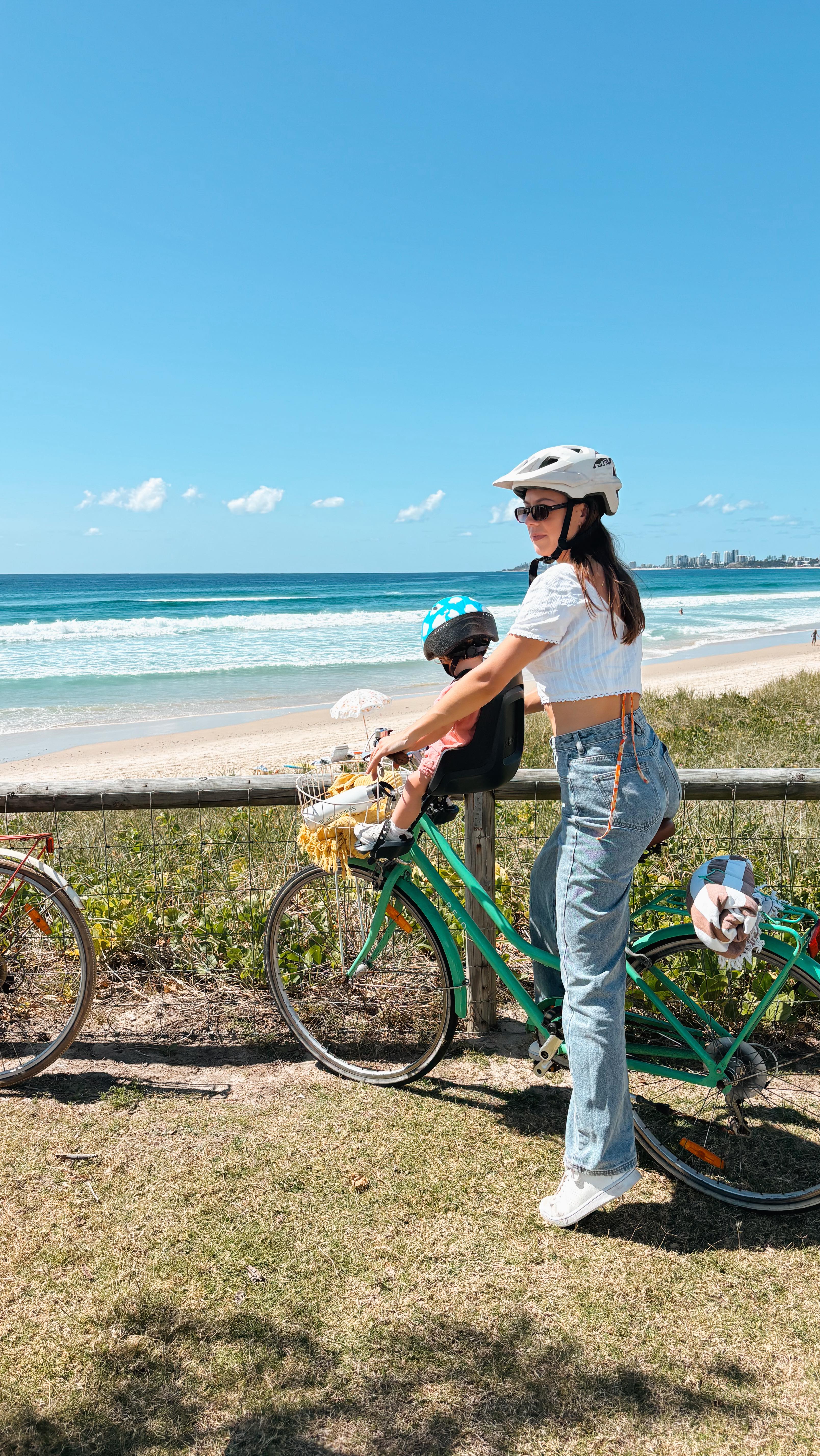 Instagram post by @hayleycarey_ for Blackmores. Caption reads: Building healthy habits together 💛🚲
Family bike....