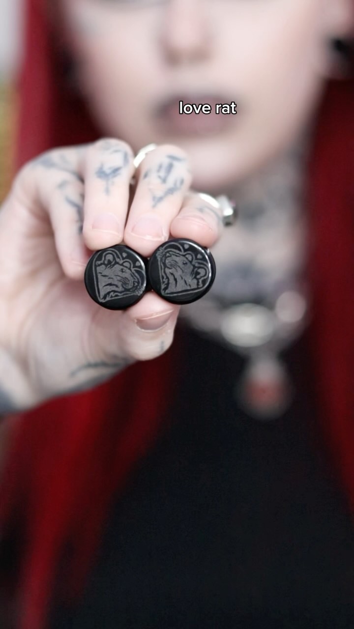 Instagram post by @wormlord5000 for Custom Plugs. Caption reads: new laser designs from @ukcustomplugs 😺....