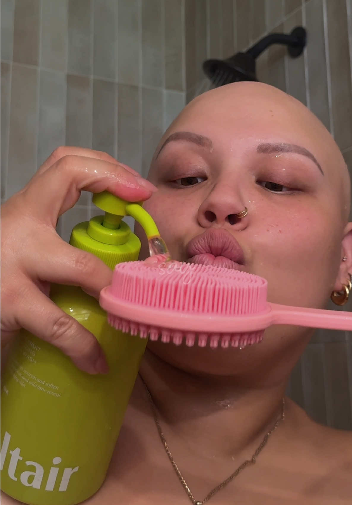 TikTok post by @baldiechi for Kate Somerville. Caption reads: [...] Body @Nécessaire @Benefit Cosmetics @Kate....