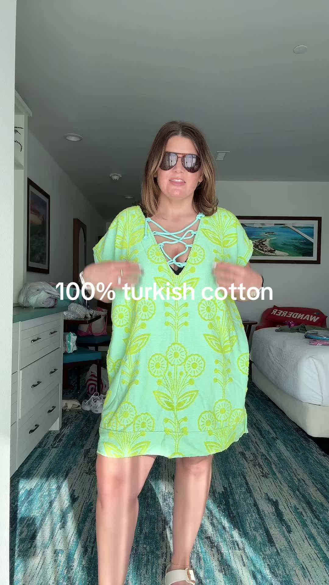 TikTok post by @discountdarlin for Sand Cloud. Caption reads: @Sand Cloud now back in stock! HURRY! #swim [...].