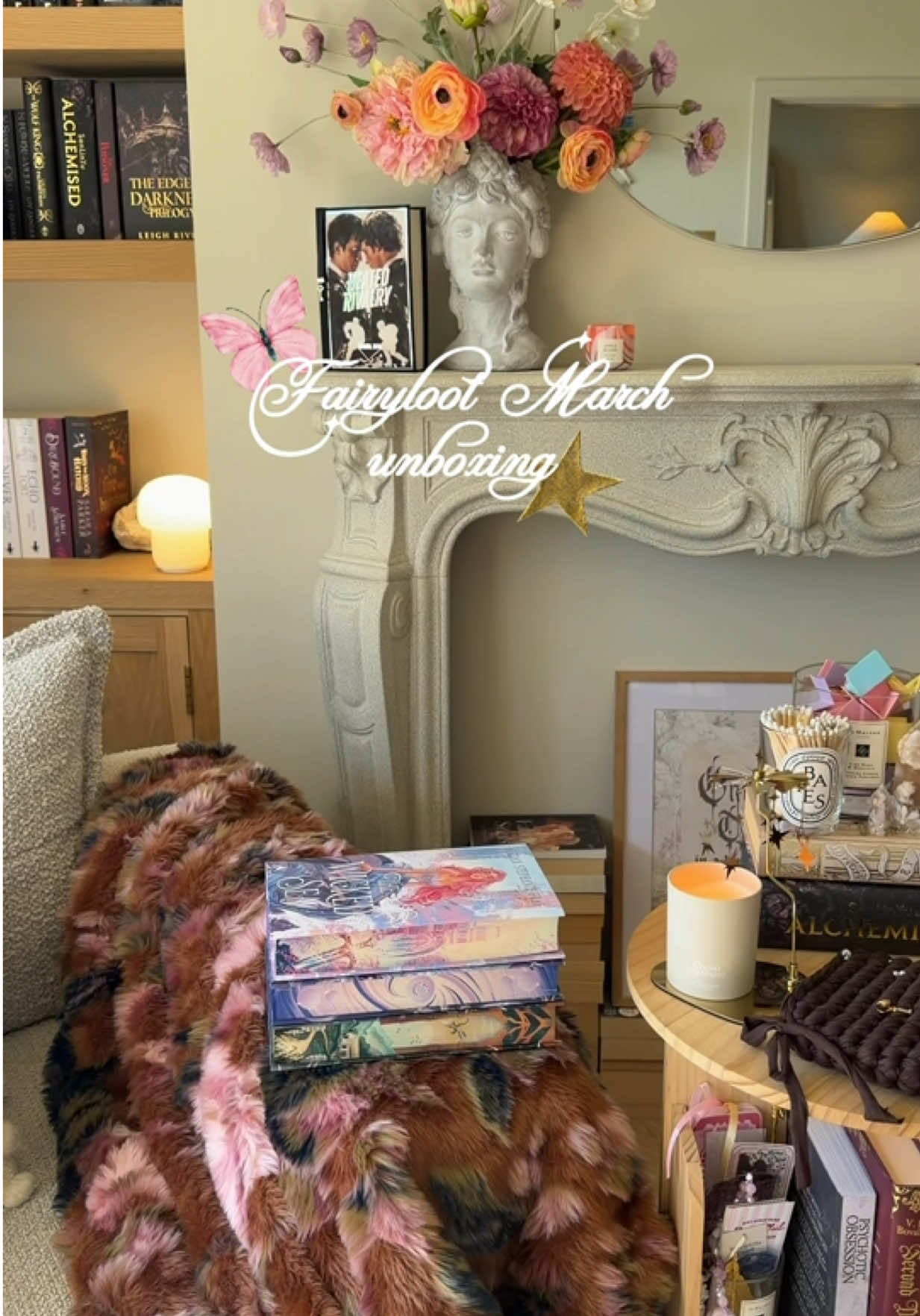 TikTok post by @_laurareads_ for FairyLoot. Caption reads: Let’s unbox my Romantasy, Adult & YA @FairyLoot....