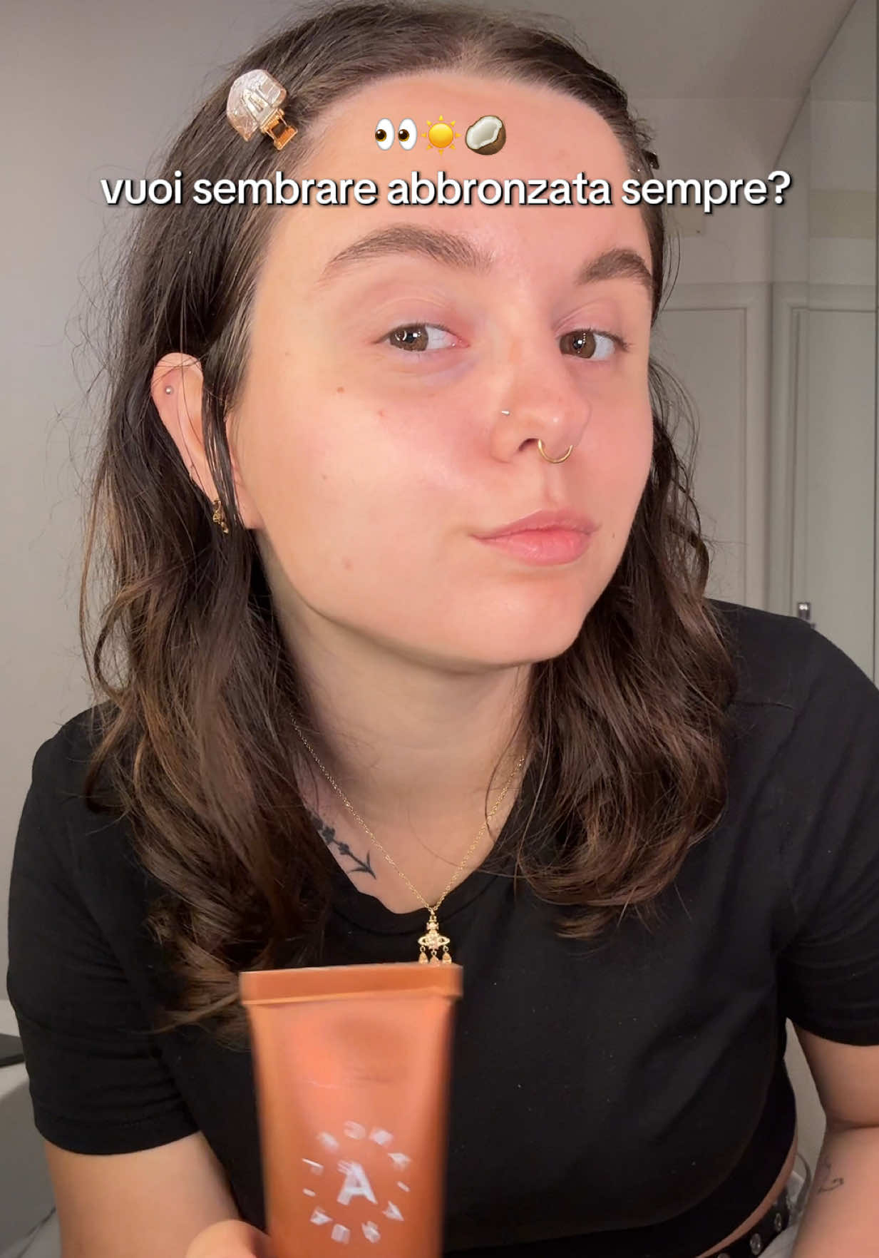 TikTok post by @deebbiee_ for NABLA Cosmetics. Caption reads: [...] abbronzata sempre? 👀☀️🥥 @NABLA Cosmetics....