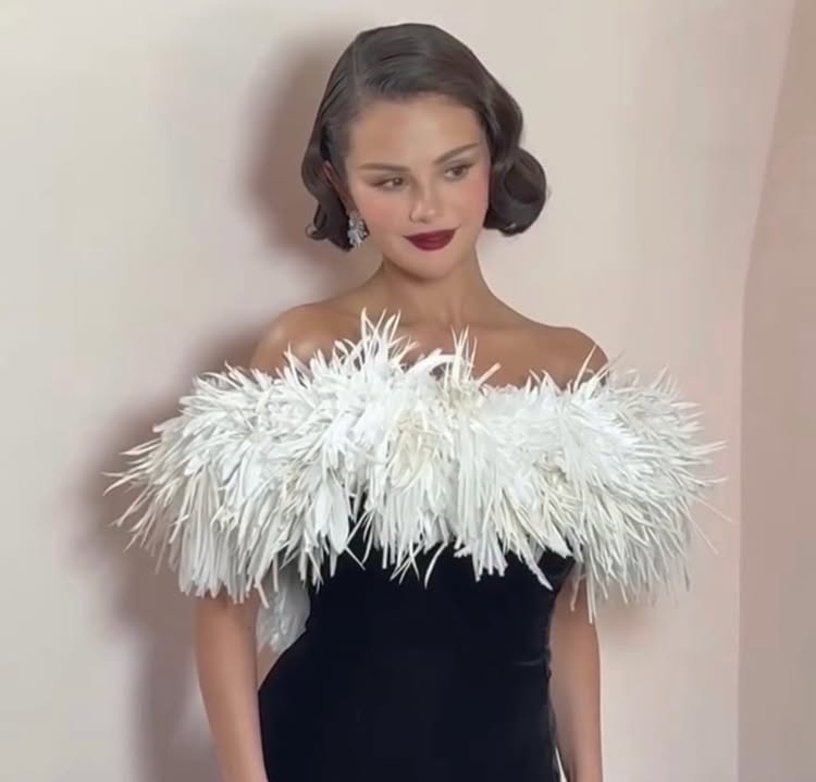 Instagram post by @selenagomez for Rare Beauty. Caption reads: a few moments at @goldenglobes - thank you for....