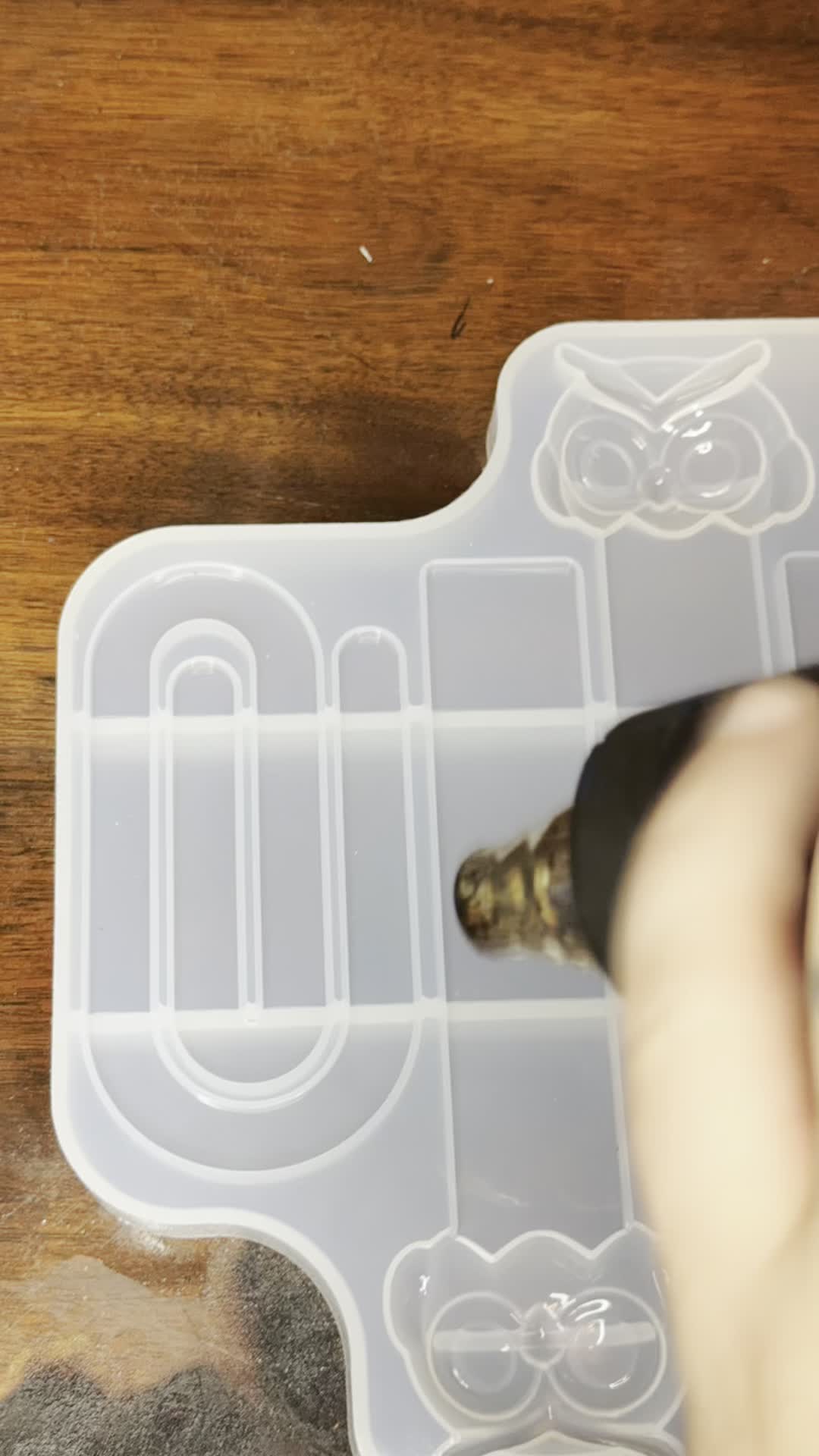 TikTok post by @rambos.emporium for Let’s Resin. Caption reads: Made new paper clip and book markers brought to....