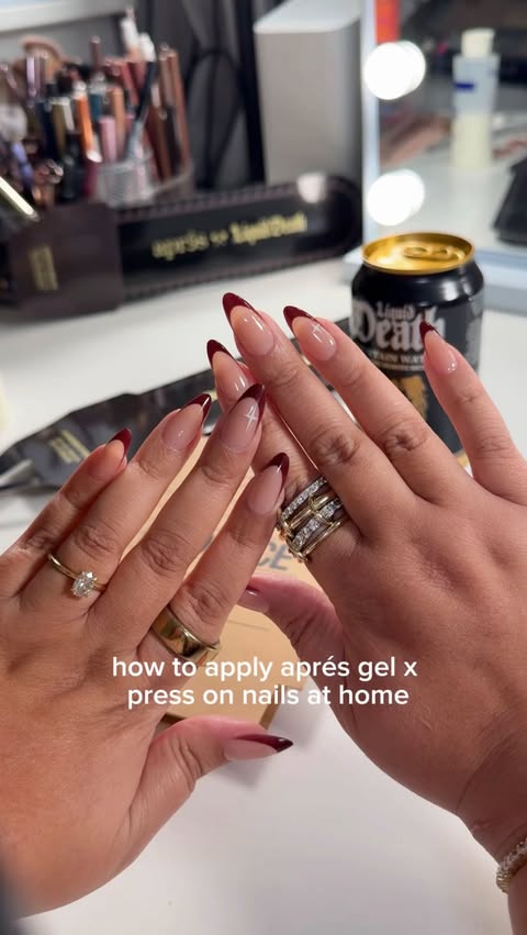 Instagram post by @michellemonroy for Liquid Death. Caption reads: [...] 🖤💅🏼 @apresnailofficial x @liquiddeath....