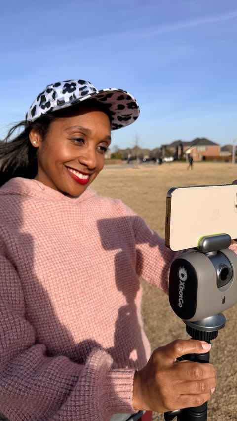Instagram post by @authenticallyamberblog for XbotGo. Caption reads: [...] and miss the moment on camera. 🙋🏽‍♀️....