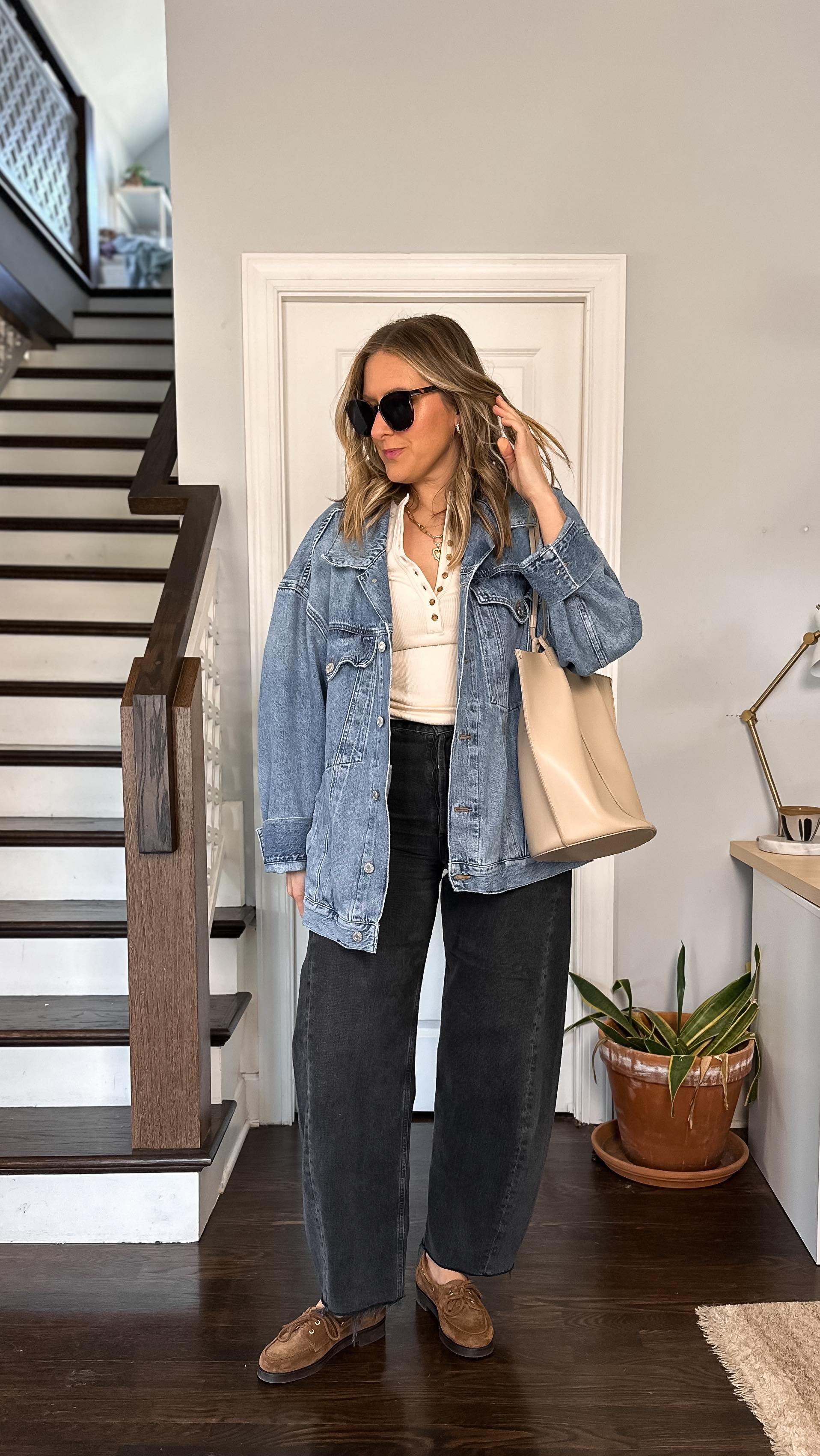 Instagram post by @michelle_tomczak for AGOLDE. Caption reads: Spring Outfit Idea✨

It was in the mid-70s today....