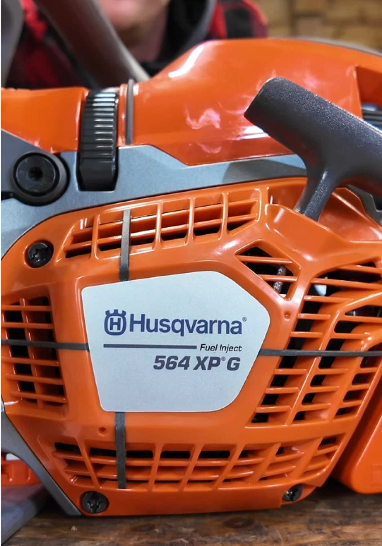 TikTok post by @machinerynation for Husqvarna. Caption reads: Unboxing NEW Chainsaw Accessories from Husqvarna....