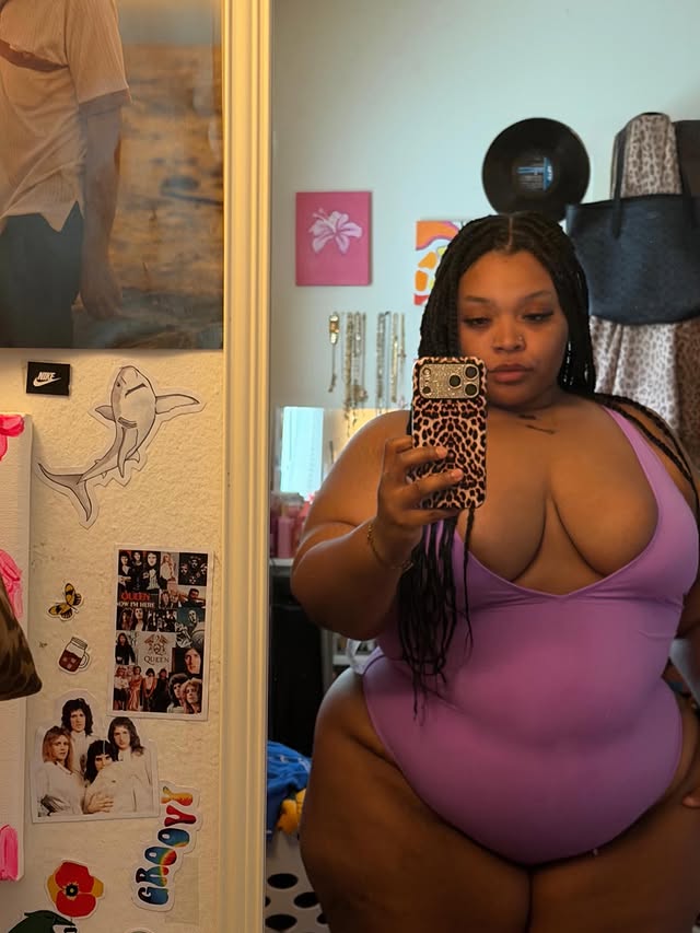 Instagram post by @camillebaaker for YITTY. Caption reads: mirror mirror🍭 swimsuit @yitty #yittyambassador.