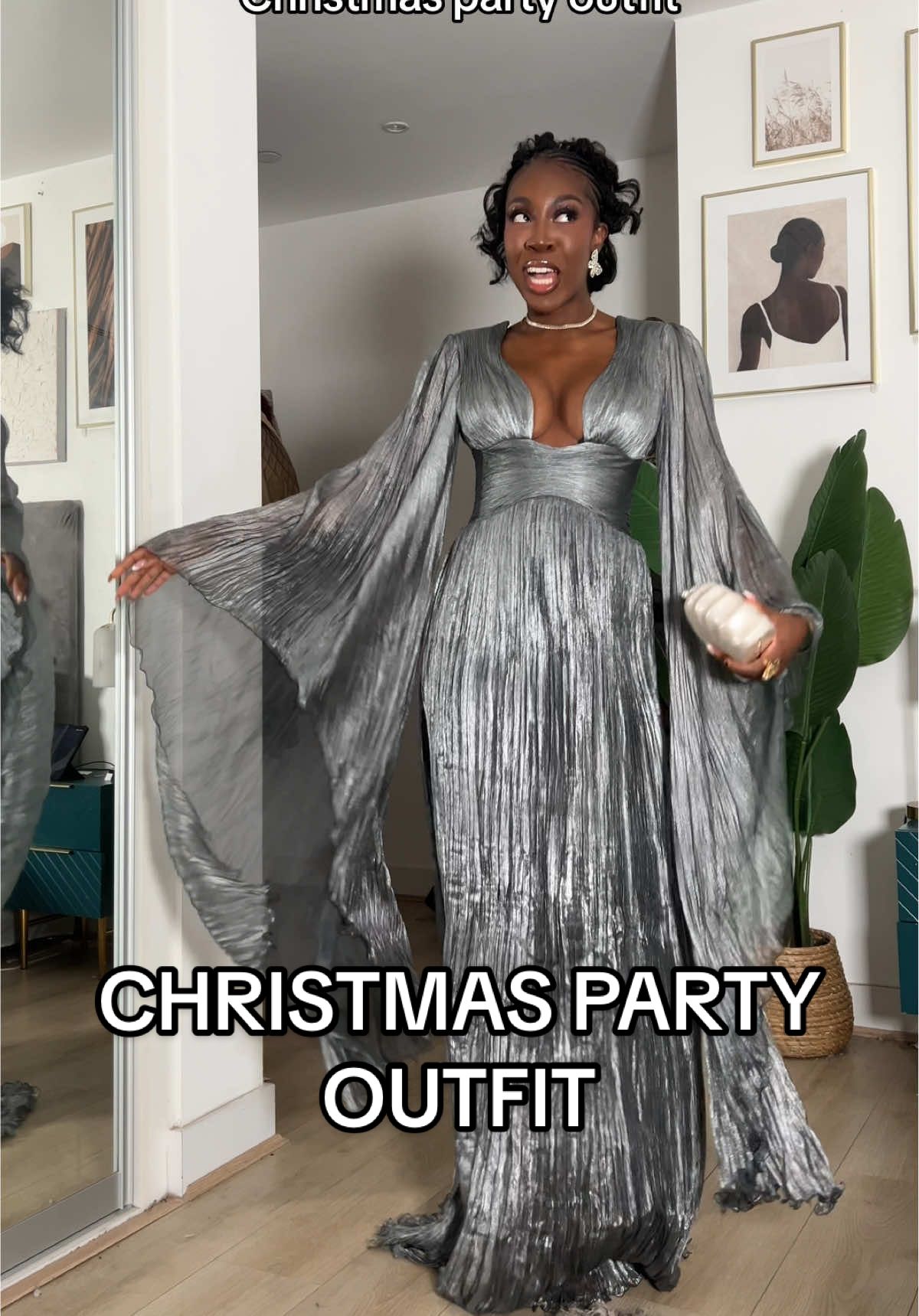 TikTok post by @sincerelyoghosa0 for Mytheresa. Caption reads: Christmas party dress! Obsessed! @Mytheresa....