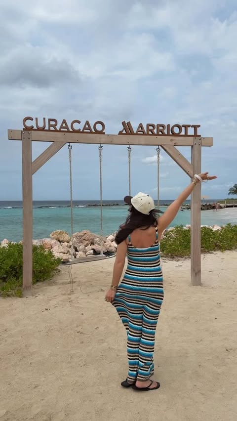 Instagram post by @kay_caputo for Marriott Hotels & Resorts. Caption reads: our stay at @curacaomarriottbeachresort was....