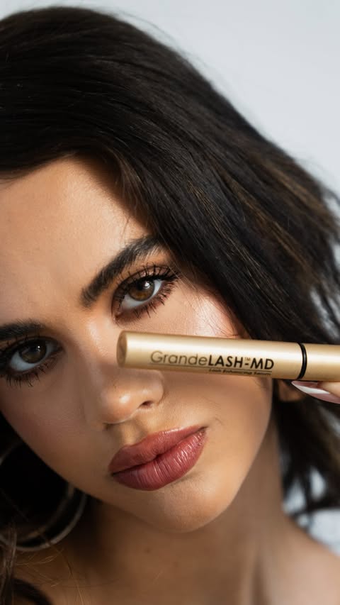 Instagram post by @madiwebb for Grande Cosmetics. Caption reads: [...] hate as a compliment;) lashes by....